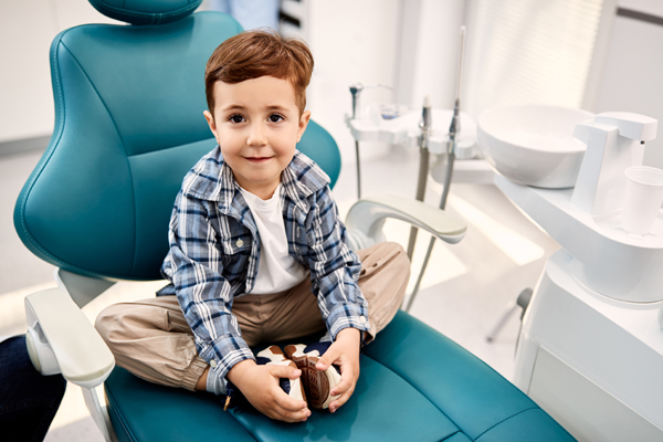 Should I Take My Child To A Kid Friendly Dentist In Omaha For White Spots On Teeth?